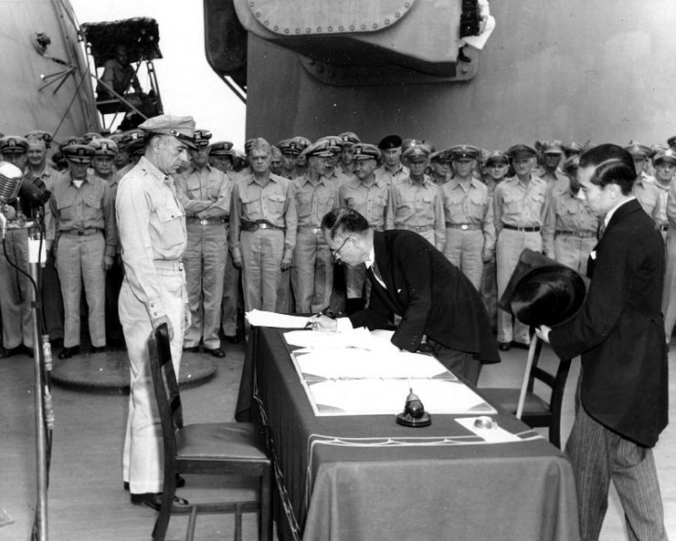 Shigemitzu, Japan's Foreign Affairs Minister signs surrender, 2 Sept. 1945 (from Wikipedia)